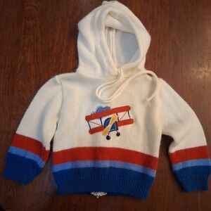 Healthtex Cream Hoodie with Red and Blue Airplane Design